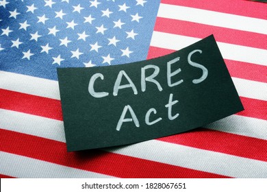 USA Flag And Word CARES Act The Coronavirus Aid, Relief, And Economic Security Act.