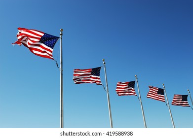 USA flags in a row waving in the wind