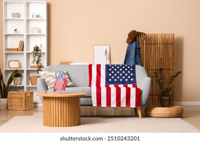 USA flags, sofa and table in interior of living room