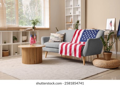 USA flags, sofa and table in interior of living room