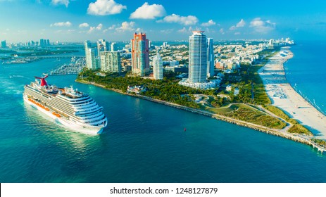USA. FLORIDA. MIAMI BEACH. DECEMBER, 2018: Cruise ship (Carnival Magic) entrance to Atlantic Ocean, from Miami port.