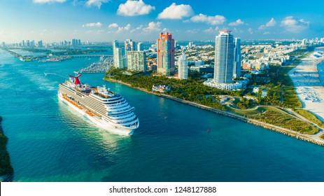 USA. FLORIDA. MIAMI BEACH. DECEMBER, 2018: Cruise ship (Carnival Magic) entrance to Atlantic Ocean, from Miami port.