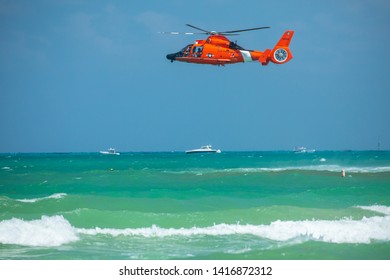 USA. FLORIDA. MIAMI BEACH. MAY 2019: US COAST GUARD AIR SEA RESCUE DEMONSTRATION. MH-65D Dolphin Helicopter. 