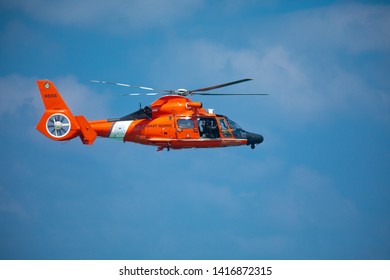 USA. FLORIDA. MIAMI BEACH. MAY 2019: US COAST GUARD AIR SEA RESCUE DEMONSTRATION. MH-65D Dolphin Helicopter. 