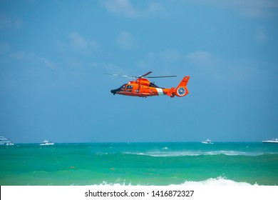 USA. FLORIDA. MIAMI BEACH. MAY 2019: US COAST GUARD AIR SEA RESCUE DEMONSTRATION. MH-65D Dolphin Helicopter. 