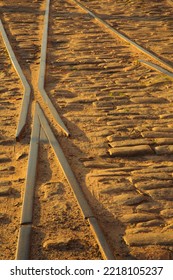 USA, Georgia, Savannah. Old Railroad Tracks Along Ballast Stones At River Street.