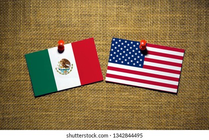 USA And Mexico Flag On Sackcloth Background