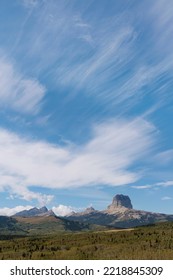 USA, Montana, Glacier National Park. Cirrus Clouds Above Chief Mountain.