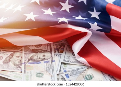 USA national flag and currency usd money banknotes. Business and finance concept