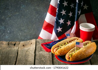 USA national holiday Labor Day, Memorial Day, Flag Day, 4th of July - hot dogs with ketchup and mustard on wood background, copy space - Powered by Shutterstock