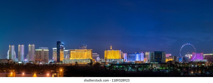 USA, Nevada, Clark County, Las Vegas. The Bright Pink, Yellow And White Neon Lights Of The Skyline Of The Strip Casinos During Blue Hour