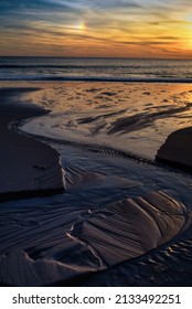 USA, New Jersey, Cape May National Seashore. Sunset On Ocean Shore.