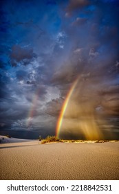 USA, New Mexico, White Sands National Park. Thunderstorm Rainbow Over Desert.