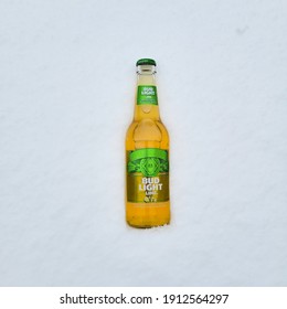 USA, New York - 8 February  2021: Beer Bud Light Lime On The Snow. Close Up View.