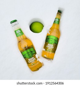 USA, New York - 8 February  2021: Beer Bud Light Lime On The Snow. Close Up View.