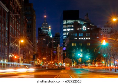 USA. New York City. Manhattan. Cooper Square. Night Traffic