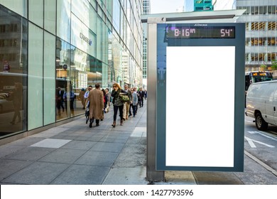 USA, New York May 6, 2019. Vertical Blank White Billboard Mockup For Advertising, Bus Stop At City Buildings And Street Background