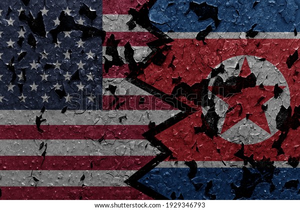 USA and North Korea flag with cracked paint
texture background. ?ollage