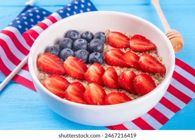 USA patriotic breakfast oatmeal. Simple Independent or American Flag Day idea with oatmeal berry flag decor, Healthy holiday July 4 breakfast - Powered by Shutterstock