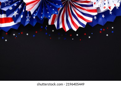 USA Patriotic Paper Fans With Red White And Blue Confetti On Black Background. Independence Day Party Concept.