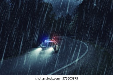 USA Police Car At Work At Night In The Forest, Heavy Rain, Motion Blur