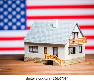 usa real estate concept: house against american flag