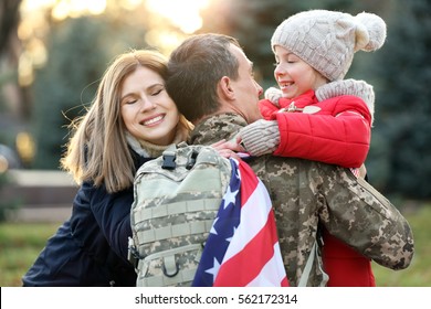 USA Soldier Hugging His Family Outdoors