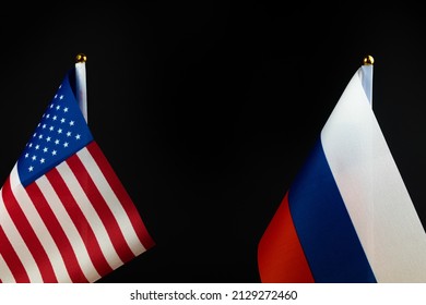 USA Vs Russia, Flags On Black Background, Copy Space Photo. Concept Of World Crisis, Cold War, Sanctions Pressure 