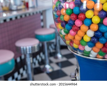 Usa, Washington State, Port Townsend. Gumball Machine And Vintage Stools At Ice Cream Shop.