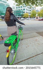 Usa, Washington State, Seattle, Woman With Rental Bicycle