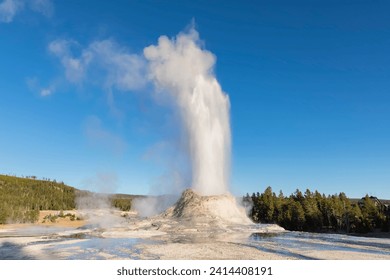 Usa- wyoming- yellowstone national park- upper geyser basin- castle geyser erupting - Powered by Shutterstock