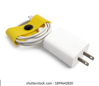 Usage example of multifunctional yellow clip as wire or cord holder. Clipping path