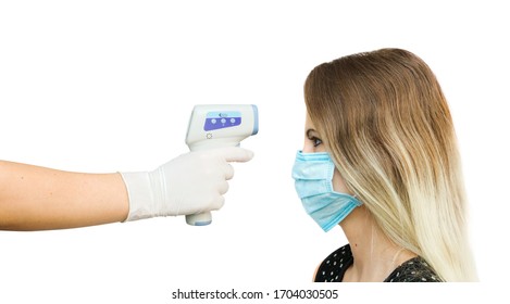 Usage of infrared non-contact forehead thermometer gun to check body temperature for virus covid-19 symptoms