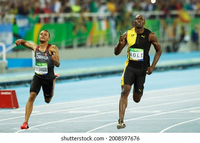 Usain Bolt of Jamaica wins Rio 2016 Olympic Games. Jamaican sprinter scores gold medal 100m sprint race final track and field. Andre de Grasse of Canada, bronze - Rio de Janeiro, Brazil 08.15.2016 