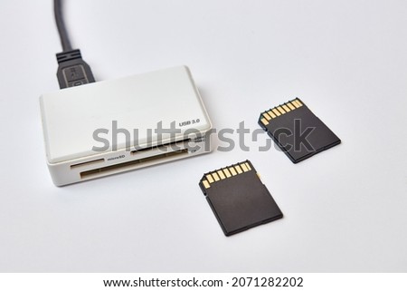 USB 3.0 speed card reader and two SD memory cards.