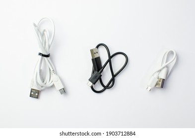 USB Cables Adapter, USB Type A C Universal Plug Cable, Mobile Phone Accessory Charger On White Background Isolated. Object And Technology Concept