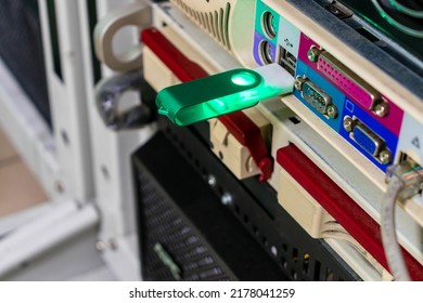 The USB flash drive is connected to a server in the data center. Installing new software from a flash drive