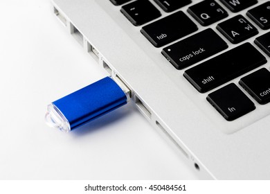 USB Flash Drive On Computer Laptop Keyboard