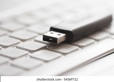 Usb flash drive over laptop keyboard - Shutterstock ID 54369712