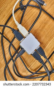 USB Hubs Connected To Each Other With Many Cables And Devices