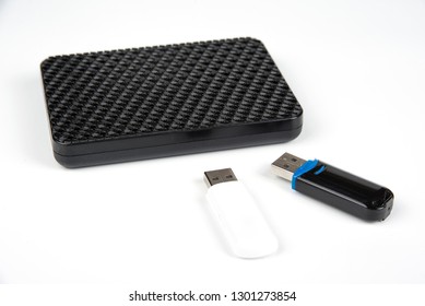 USB key and external hard disk on the white