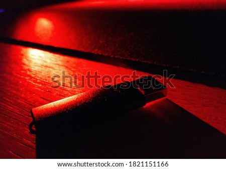 Usb memory in red light. Security risk symbol. IT domain. 