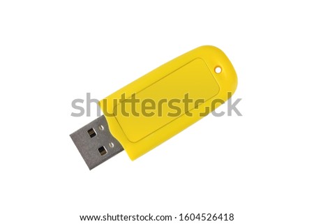 USB memory stick - Yellow flash drive on white insulated background. Close-up