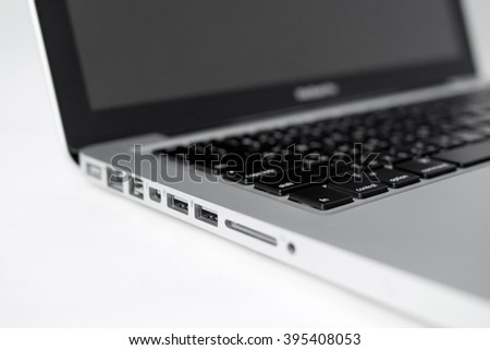 USB port with MacBook Pro on white background