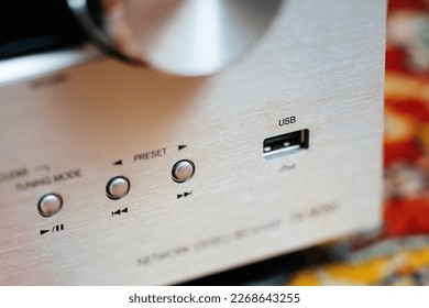USB port on a high-end stereo audio hi-fi receiver - close-up tilt-shift lens used