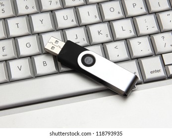 USB Thumb Drive On A Laptop Keyboard