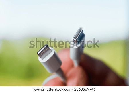 USB type C port cable to charge the smartphone. EU law to force USB-C chargers. Lightning to USB-C.