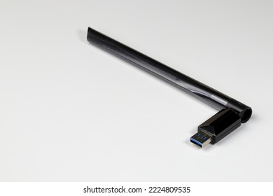 USB wifi adapter, USB wireless network card, wireless internet usb adapter isolate on white background shallow focus. - Powered by Shutterstock