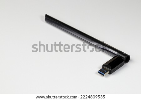 USB wifi adapter, USB wireless network card, wireless internet usb adapter isolate on white background shallow focus.