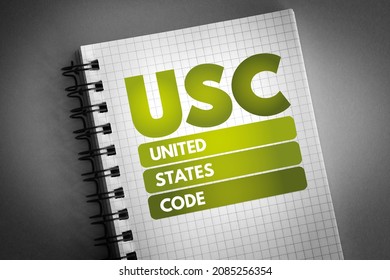 USC - United States Code is the codification by subject matter of the general and permanent laws of the United States, acronym text on notepad